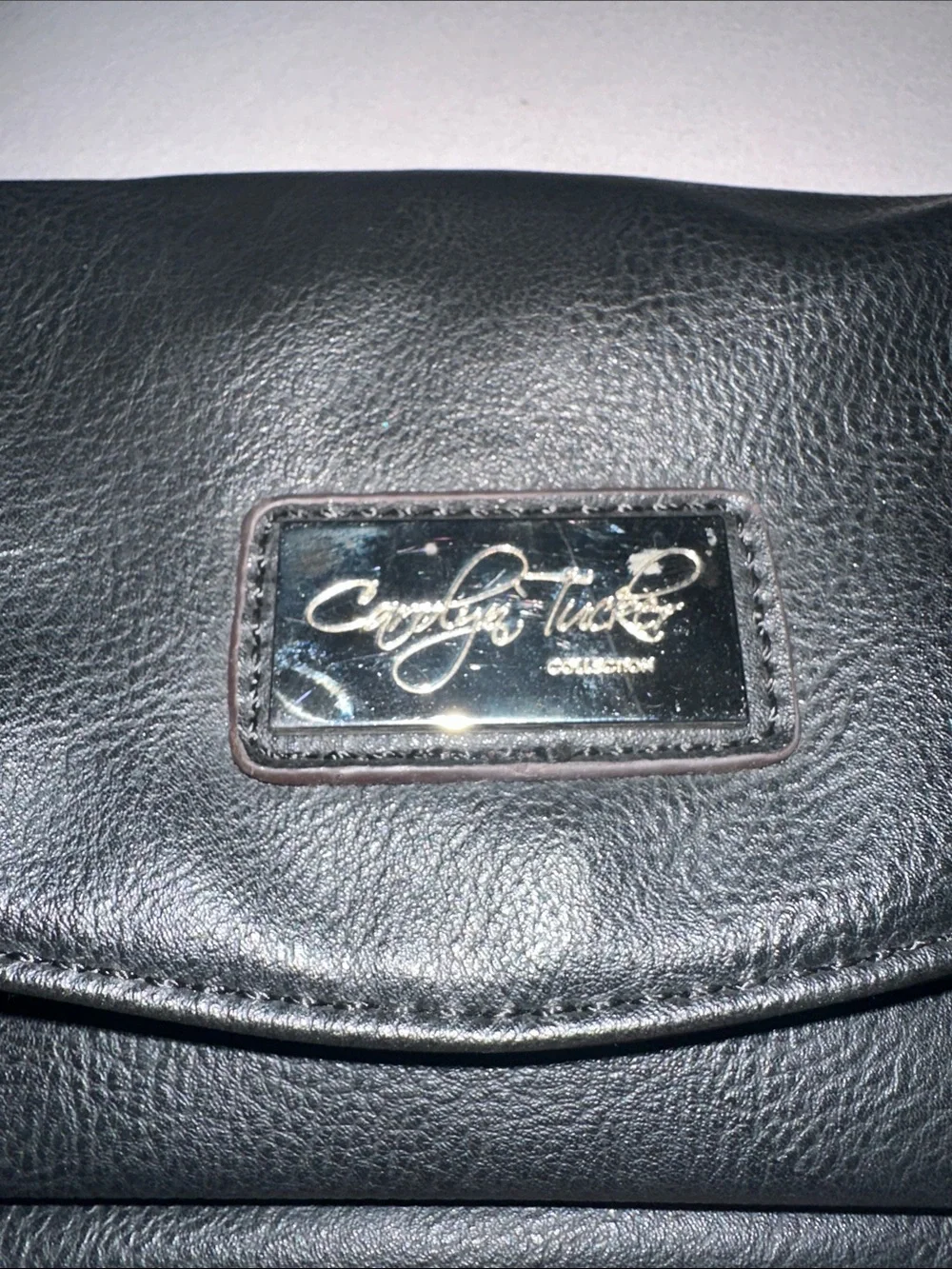 Carolya Tucker Fold-Over Black Leather Wristlet Clutch with Metal Logo Plaque ne